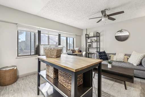 Kitchen with an island at Archer Tower in Denver, CO