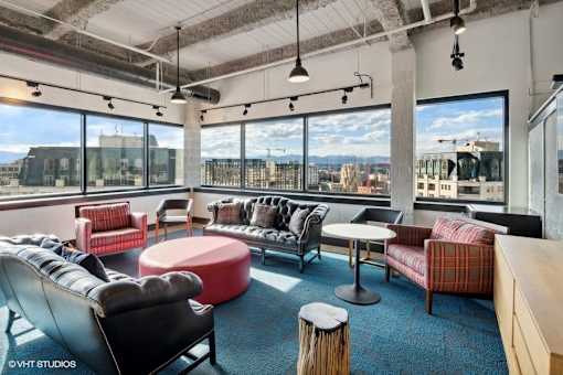 Penthouse entertainment lounge with comfortable seating at Archer Tower in Denver, CO