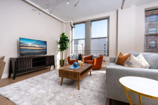 a living room with a couch and a tv