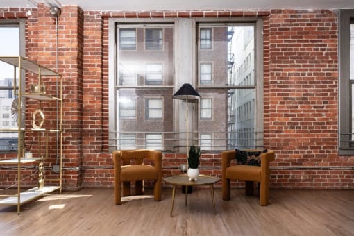 a kitchen and dining room with a table and chairs
