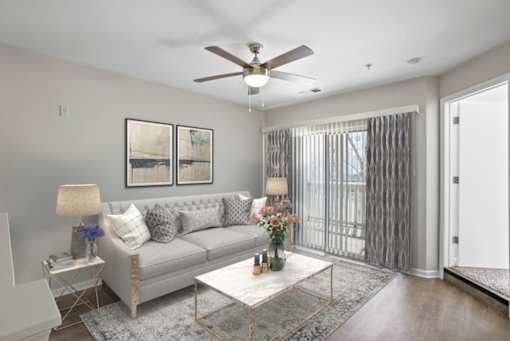 Spacious & sun-filled living room at The Crossings at Russett in Laurel, MD