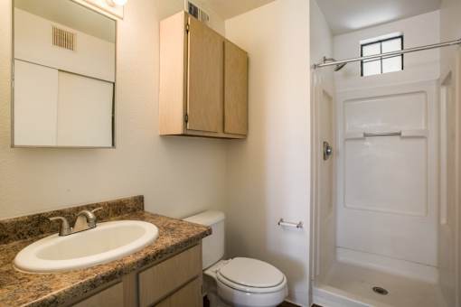 Bathroom with extra storage and a walk in shower