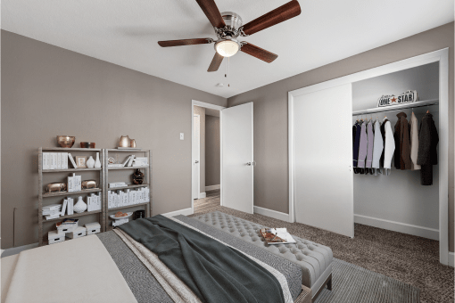 Large one bedroom with a ceiling fan and closet