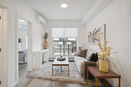 a living room with a couch and a coffee table
