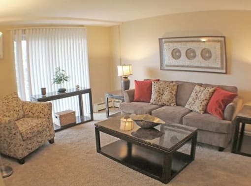 a living room with a couch and a table