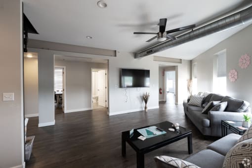 a living room with a couch and a coffee table