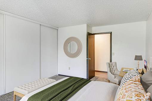 Bedroom With Closet at Pheasant Park Apartments, New Hope, MN