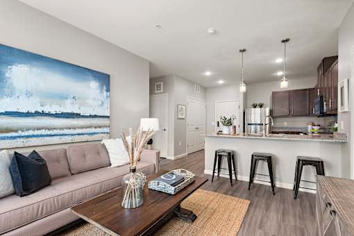 Living Area With Kitchen View at Decatur Landing I & II, Brooklyn Park, MN 55445