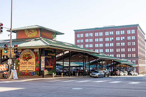 A street view of a market with a sign that says Saint Paul. at Parkside Apartments, Minnesota