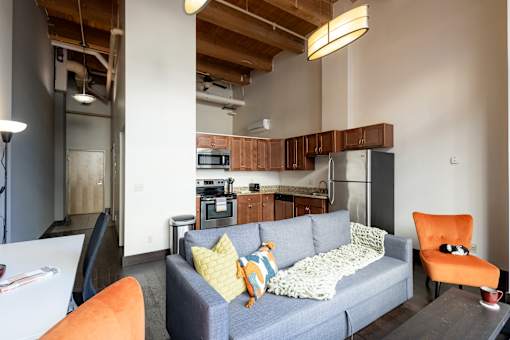 Living area and Kitchen at background at Parkside Apartments, St. Paul, MN, 55101