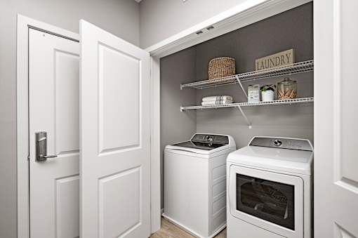 A laundry room with a washer and dryer.