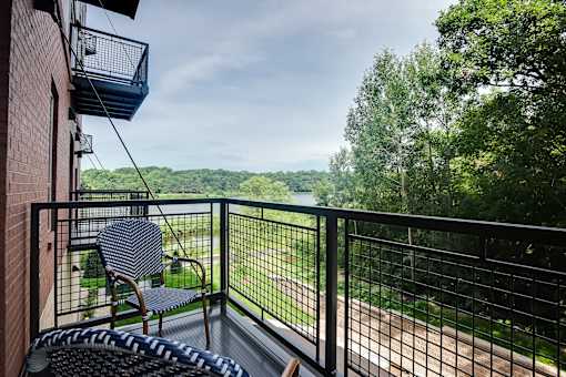 patio with views of nature at Lake Jonathan Flats, Chaska, MN