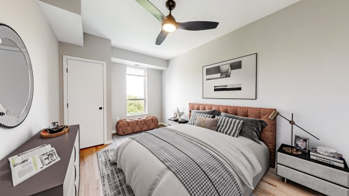 bedroom with a bed and a ceiling fan at Ardor on the Bluffs South Loop Residences Apartments, Bloomington, MN, 55425