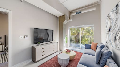 a living room with a couch and a tv at Ardor on the Bluffs South Loop Residences Apartments, Minnesota, 55425
