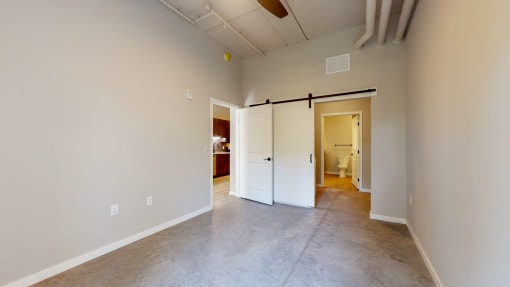 A room with a white door and a white wall at Ardor on the Bluffs South Loop Residences Apartments, Bloomington, 55425