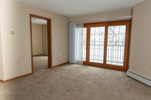 a look at the living room from the dining room  at Briarcliff Apartments, a 55+ Community, Minnesota, 55115