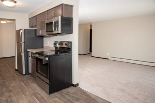 upgraded kitchen with slate cabinets, full stainless steel appliance package