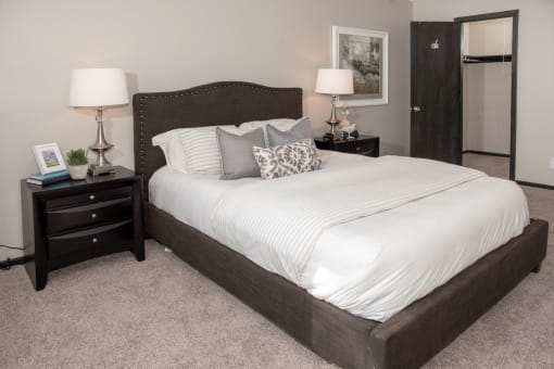 one plus den model,  spacious bedroom with large closet