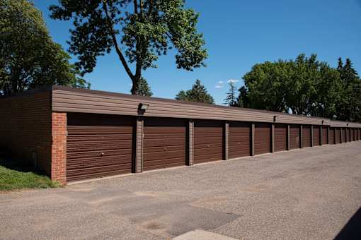 A long row of brown garage doors.