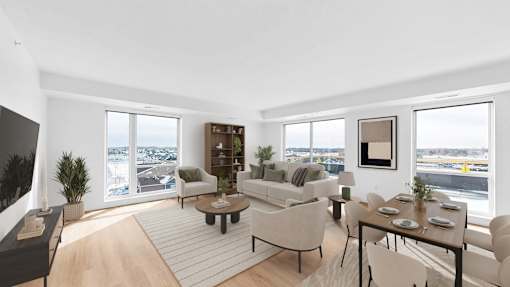 A modern living room with a view of the city.