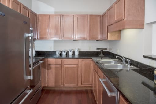 kitchen with stainless steel appliances, granite countertops