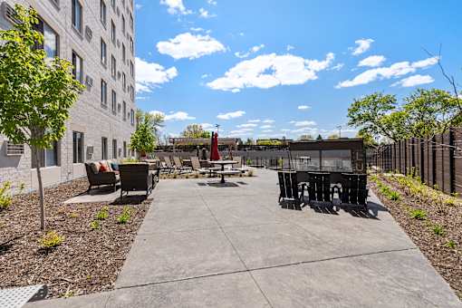 Concrete patio at Lux Apartments, Brooklyn Center, Minnesota