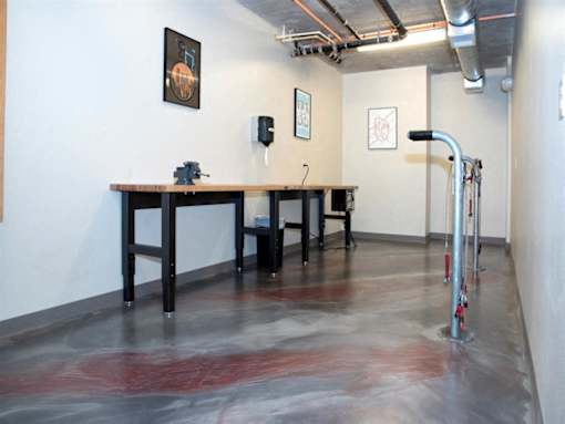 A room with a table and chairs and a pull up bar.at Third North Apartments, Minneapolis, 55401