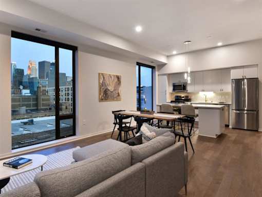 Living Room With Kitchen View at Viridium Apartments, Minnesota, 55401