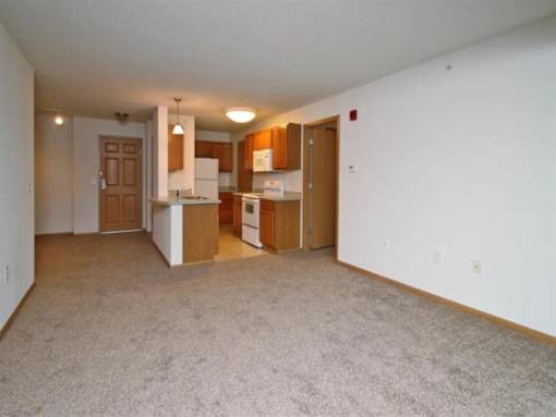 Kitchen with White Appliances at Joseph's Pointe at Upper Landing Apartments, St. Paul, MN