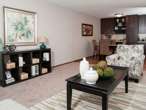 Living room with white sofa at Terra Pointe Apartments, Saint Paul, MN, 55119