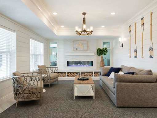 Living area with fireplace at The Barnum Apartments, White Bear Lake, MN,  55110