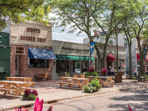 A barbeque restaurant named Henry's Barbeque Shop is located in a shopping plaza at The Barnum Apartments, Minnesota, 55110