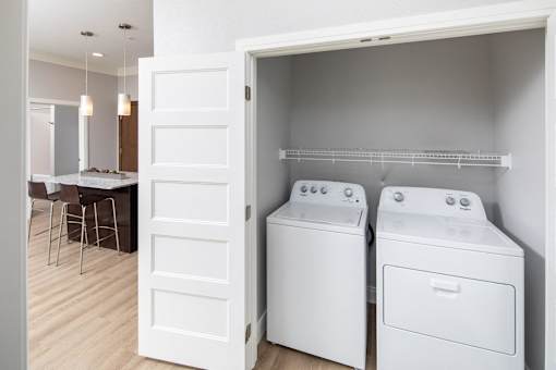 laundry room with a washer and dryer at The Edison at Spirit, Shoreview