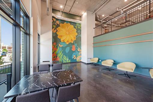A conference room with a large table and chairs at Soul Apartments, Minnesota 55107