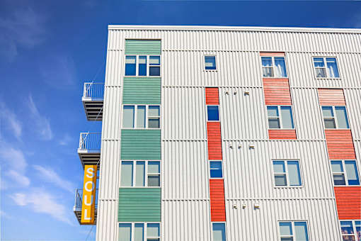 A building with the multiple colors at Soul Apartments, St. Paul, MN 55107