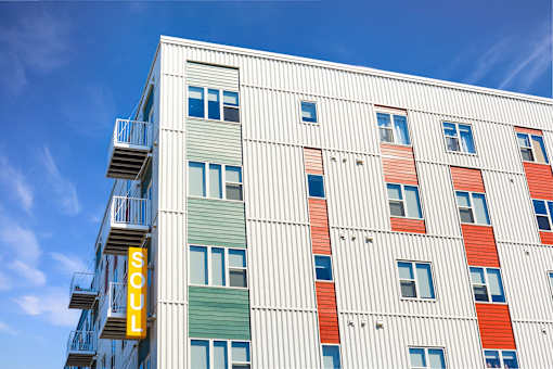 A building with the word SOUL on the side at Soul Apartments, Minnesota
