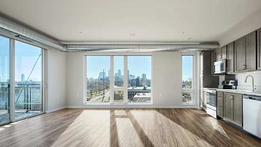 Kitchen with a View of the City at Peregrine Apartments, Minnesota, 55411