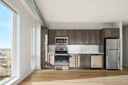 Kitchen with a Wooden Floors at Peregrine Apartments, Minneapolis, MN, 55411