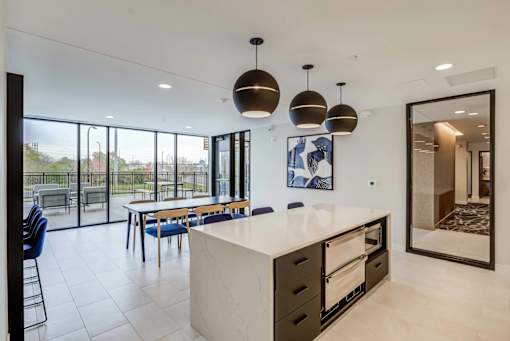 Kitchen with a Large Island at Peregrine Apartments, Minneapolis, 55411