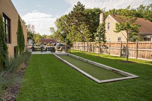 outdoor patio with bocce ball court