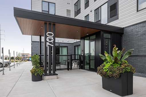 The front of a building with the number 7600 on it.