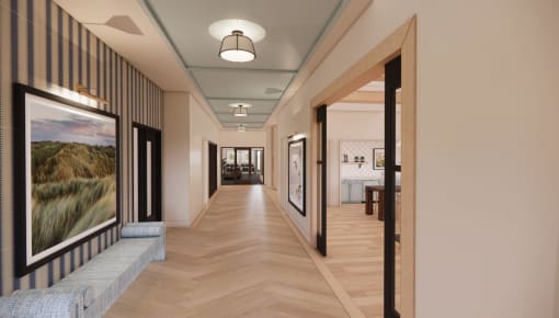 a long hallway with wood floors and a painting on the wall at Sandhill Parkway Townhomes Apartments, Minnesota
