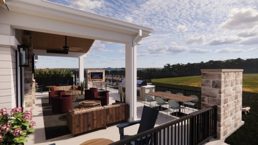 a covered patio with tables and chairs on a patio at Sandhill Parkway Townhomes Apartments, East Bethel, Minnesota