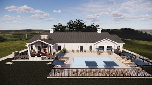 A large house with a pool in the backyard.