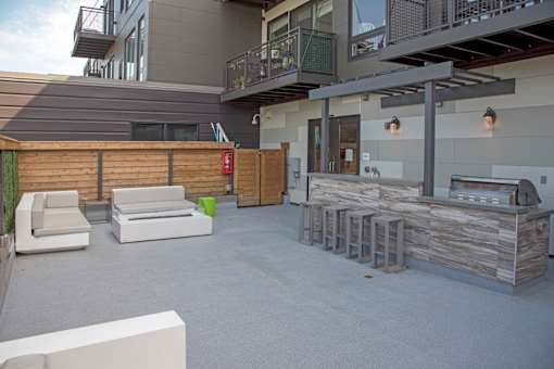 outdoor patio and kitchen with grilling area
