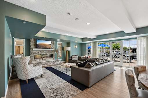A living room with a fireplace and a couch.