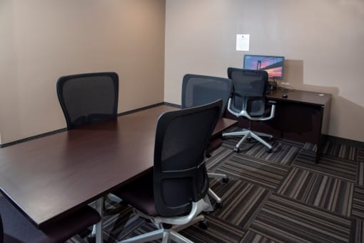 Business Center with computer and meeting table
