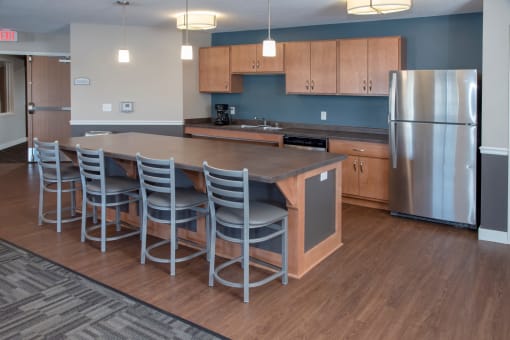Community kitchen with serving bar perfect for entertaining