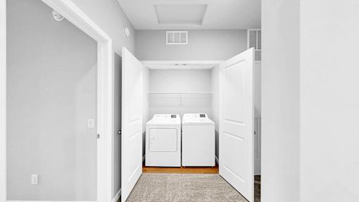 A laundry room with a washer and dryer.