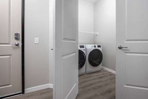 A laundry room with a washer and dryer.